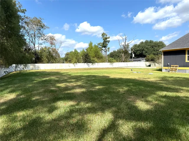 a view of an outdoor space and a yard
