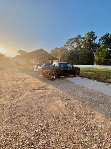 a view of a lake with outdoor space