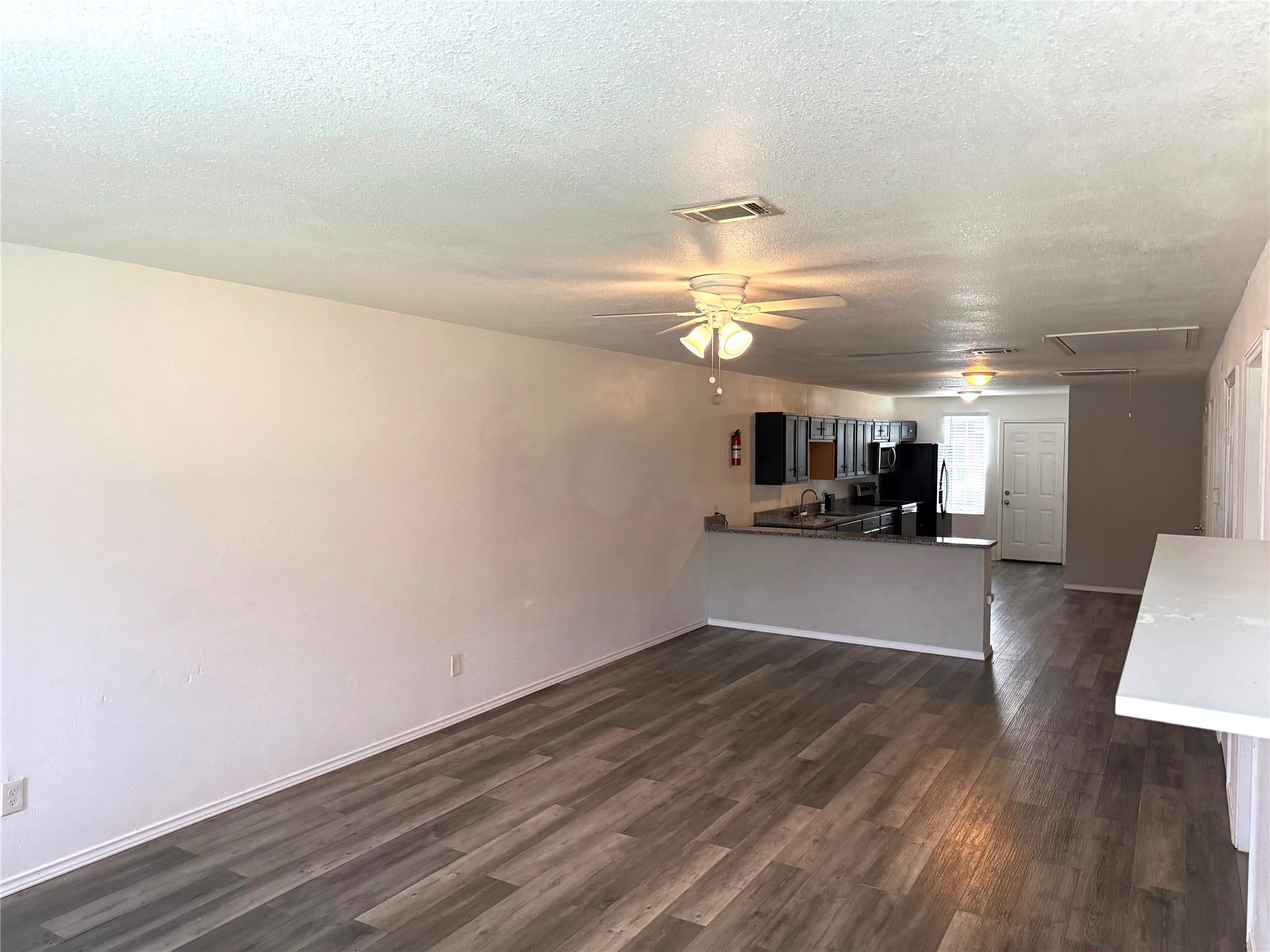 9822 Candy Court, Unit B Spring, TX 77379 - Photo 7 of 27 a view of a livingroom with a furniture