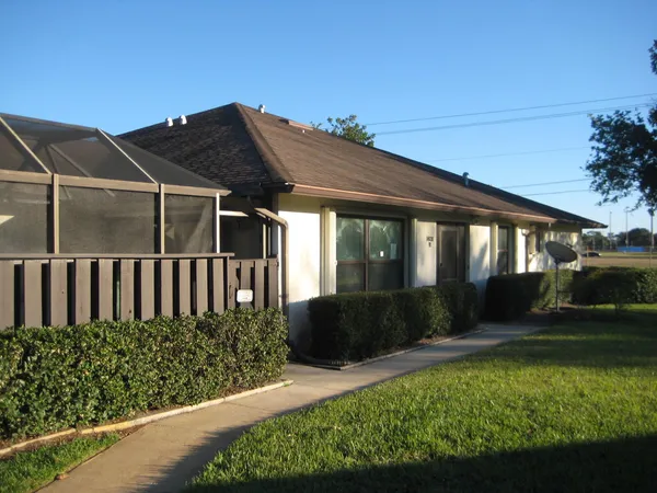 a view of a backyard with garden