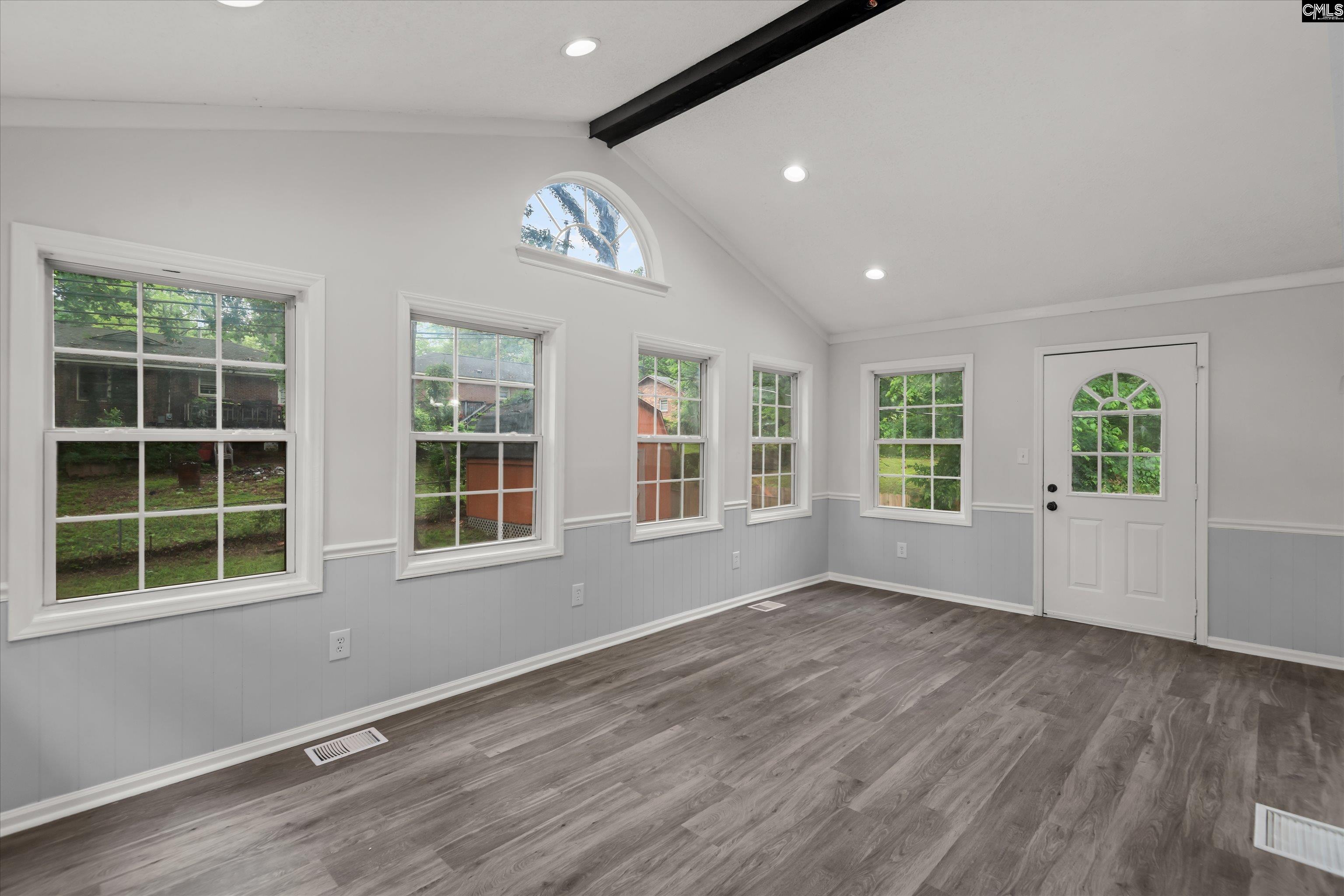 245 Piney Grove Road Columbia, SC 29210 - Photo 14 of 29 an empty room with wooden floor and windows