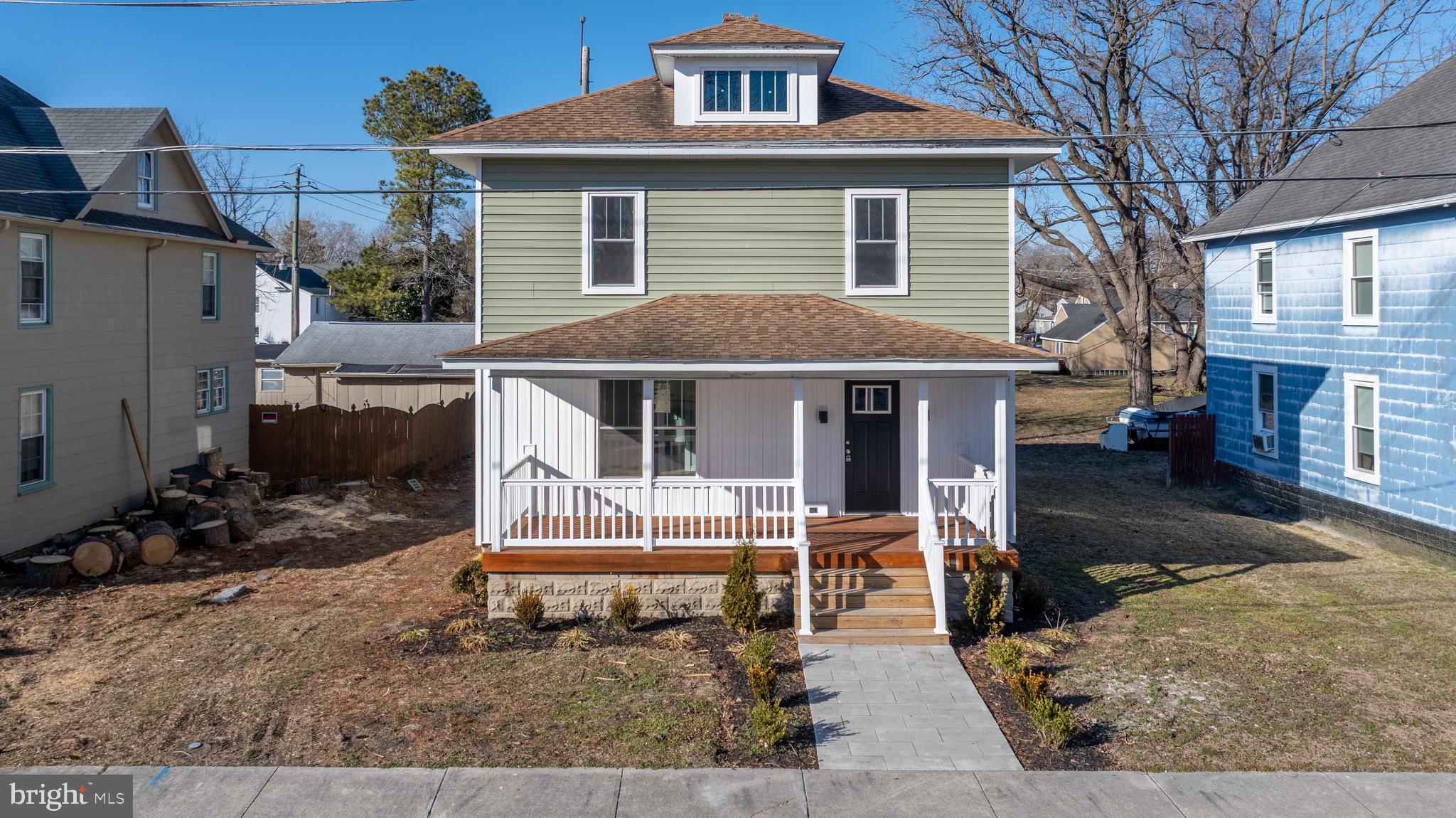 603 East Chestnut Street Delmar, MD 21875 - Photo 1 of 33 a front view of a house with a yard