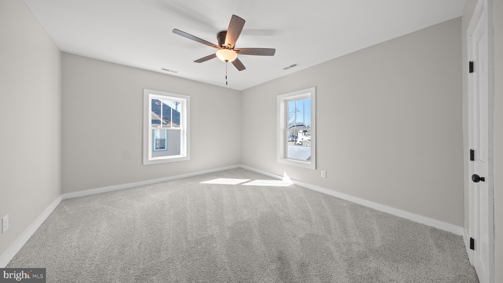 603 East Chestnut Street Delmar, MD 21875 - Photo 21 of 33 an empty room with windows and fan