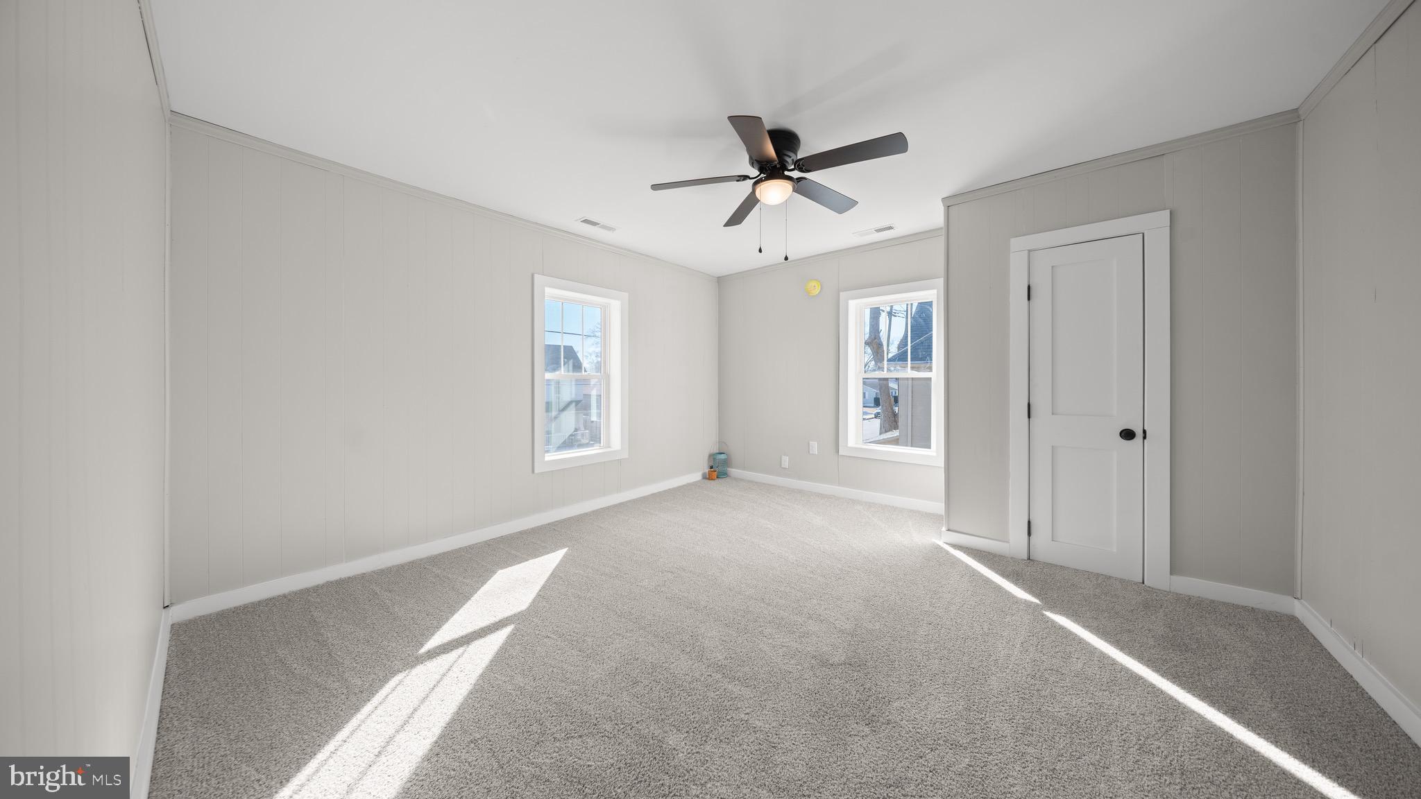 603 East Chestnut Street Delmar, MD 21875 - Photo 24 of 33 a view of a livingroom with a ceiling fan and window
