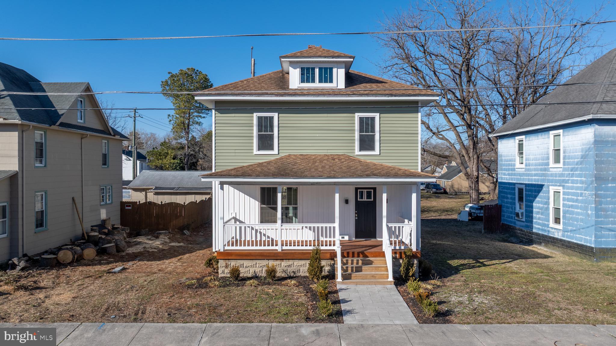 603 East Chestnut Street Delmar, MD 21875 - Photo 26 of 33 a front view of a house with a porch