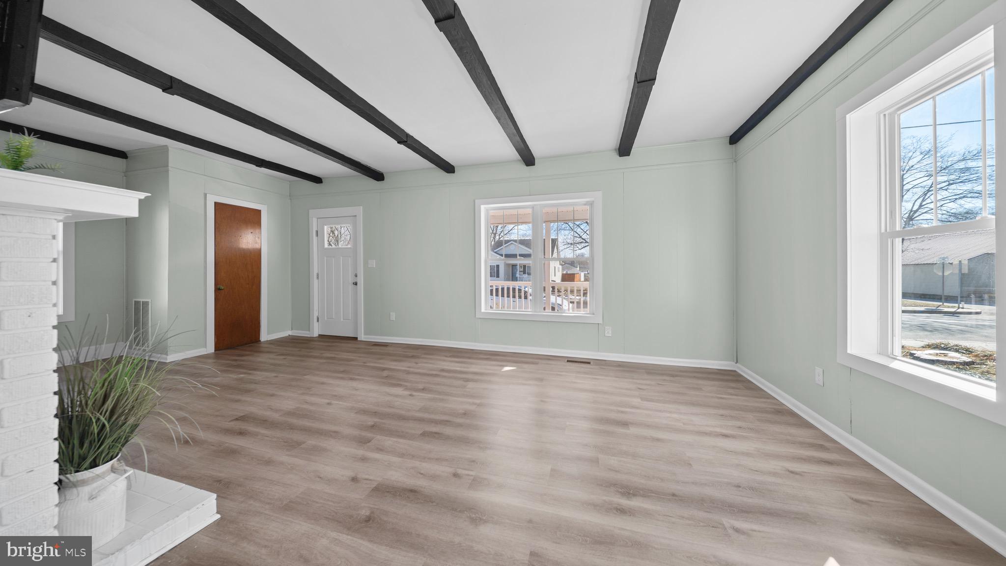 603 East Chestnut Street Delmar, MD 21875 - Photo 5 of 33 a view of an empty room with a window