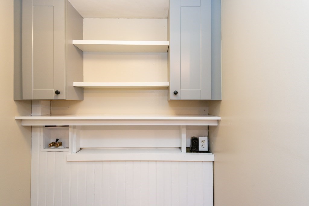 13 Melville Place Lynn, MA 01902 - Photo 13 of 41 a view of cabinets and wooden floor