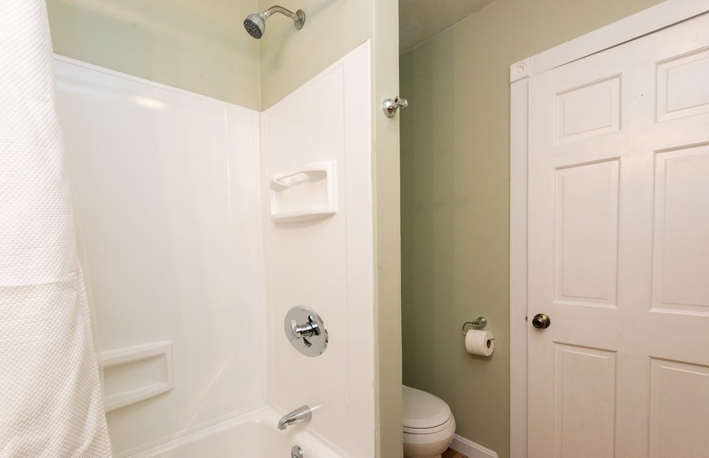 13 Melville Place Lynn, MA 01902 - Photo 17 of 41 a bathroom with a granite countertop bathtub shower and toilet