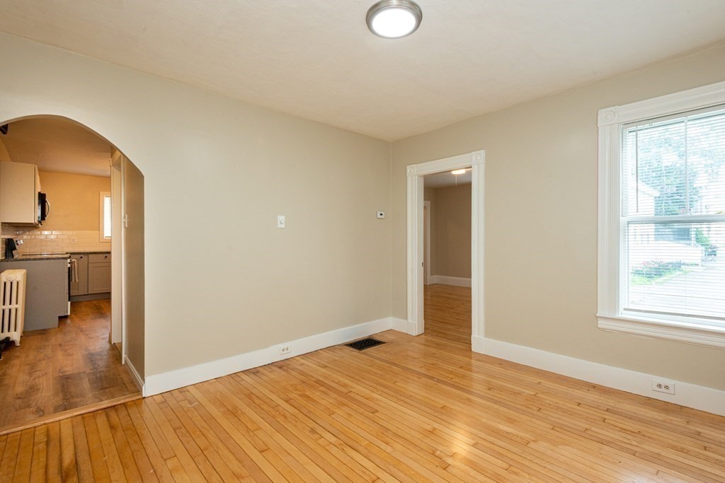 13 Melville Place Lynn, MA 01902 - Photo 18 of 41 a view of empty room with wooden floor