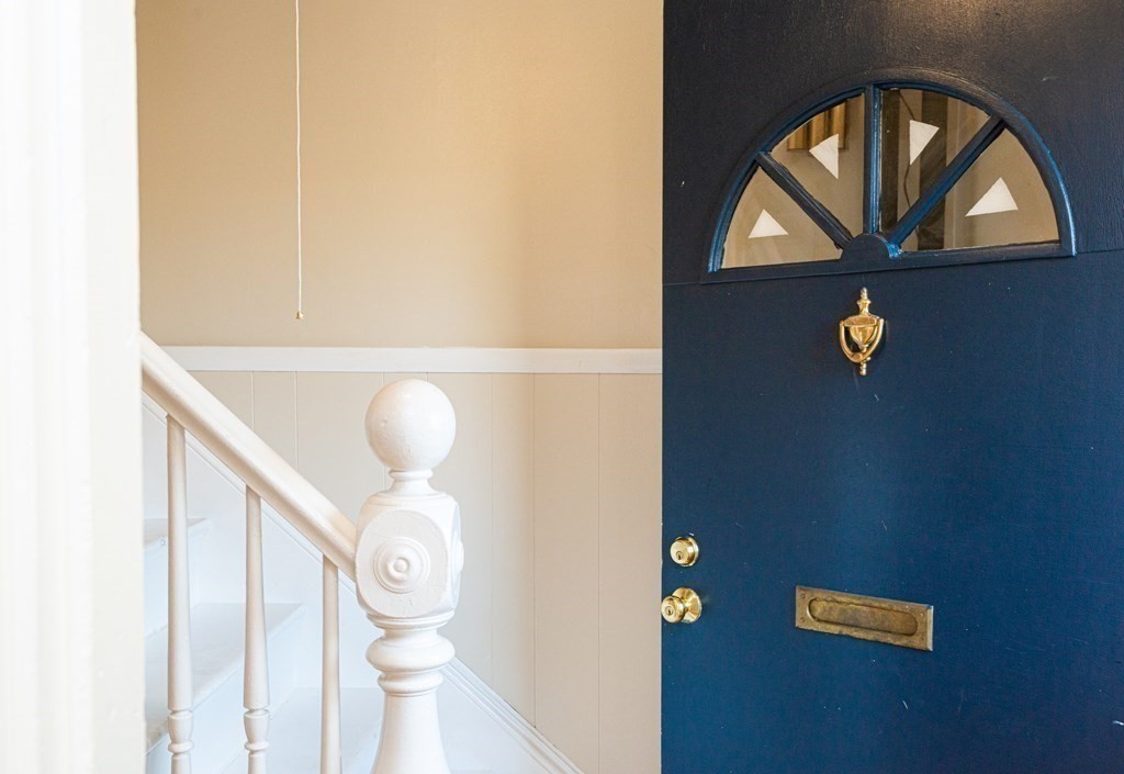 13 Melville Place Lynn, MA 01902 - Photo 3 of 41 a close view of light fixtures and a window