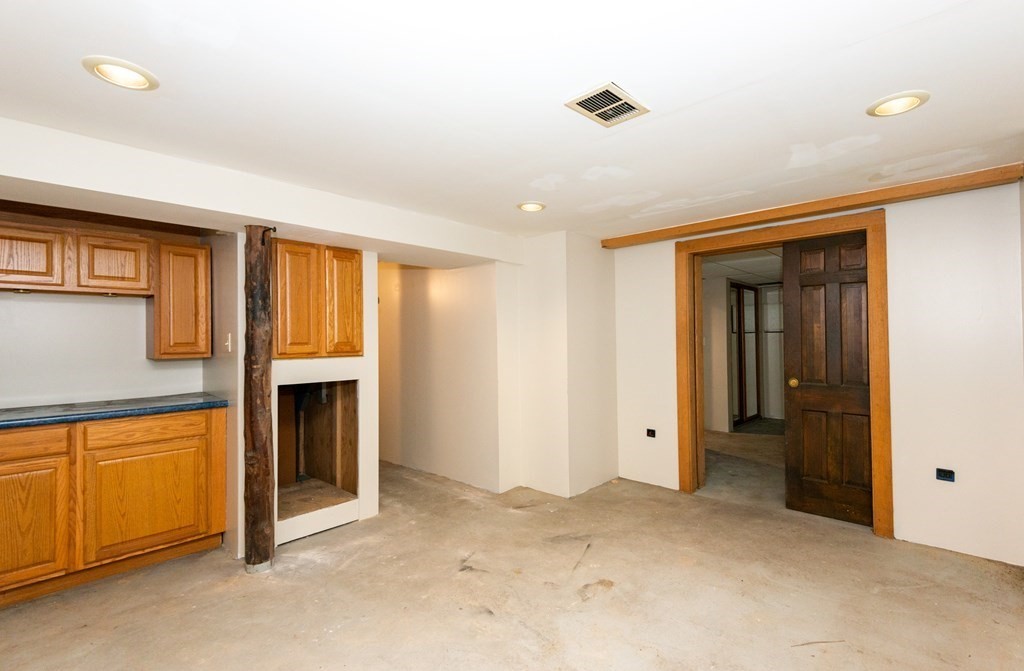 13 Melville Place Lynn, MA 01902 - Photo 34 of 41 a view of an empty room with window and cabinet