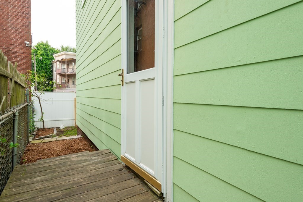 13 Melville Place Lynn, MA 01902 - Photo 37 of 41 a view of outdoor space and wooden deck
