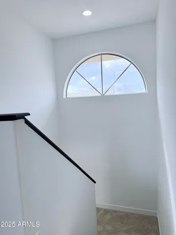 a view of a hallway with entryway