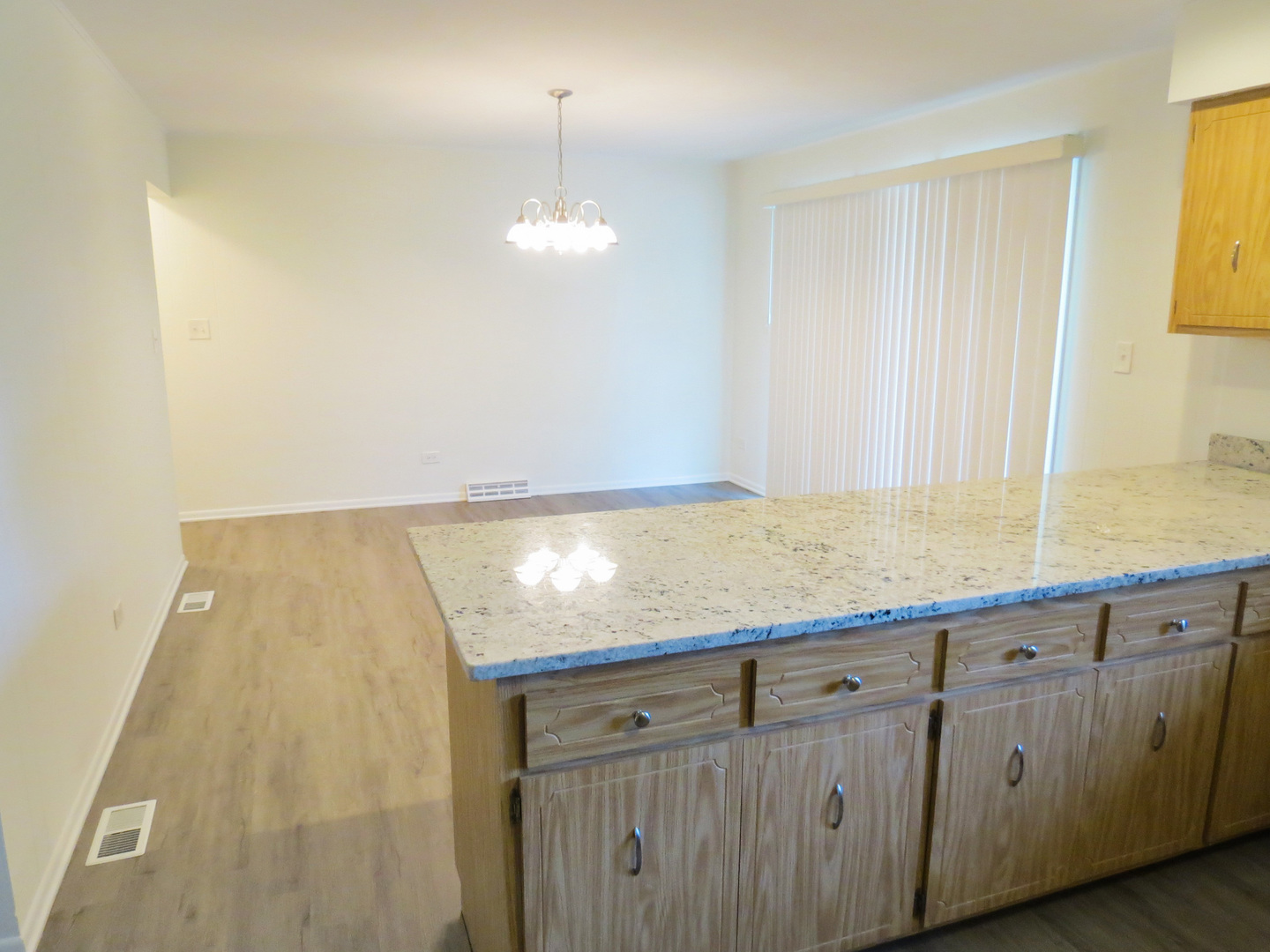 12970 McCarthy Road Lemont, IL 60439 - Photo 16 of 46 a view of kitchen and center island in center