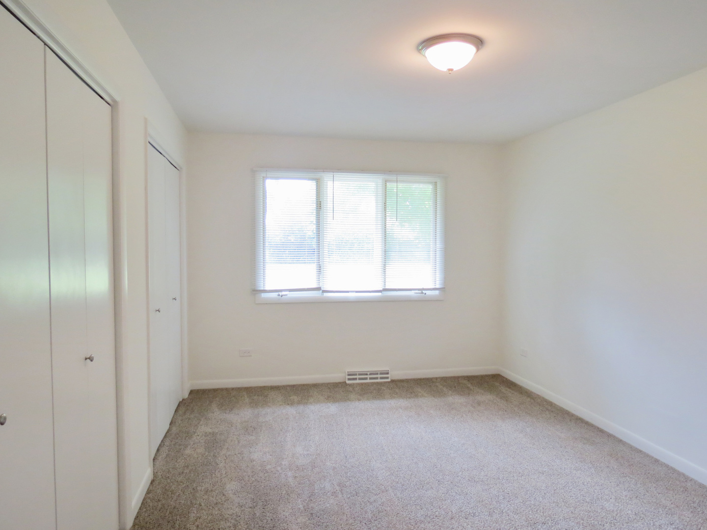 12970 McCarthy Road Lemont, IL 60439 - Photo 26 of 46 an empty room with a window