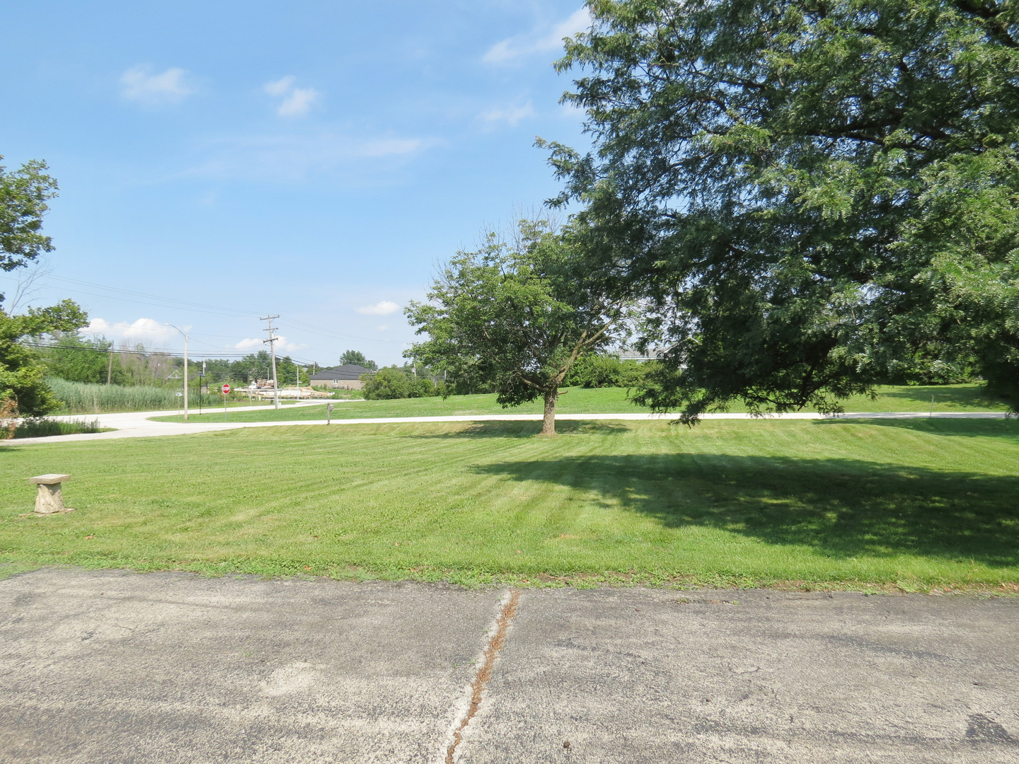 12970 McCarthy Road Lemont, IL 60439 - Photo 41 of 46 a view of a golf course with a lake