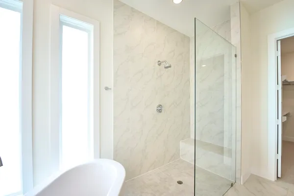 a bathroom with a granite countertop sink mirror and a