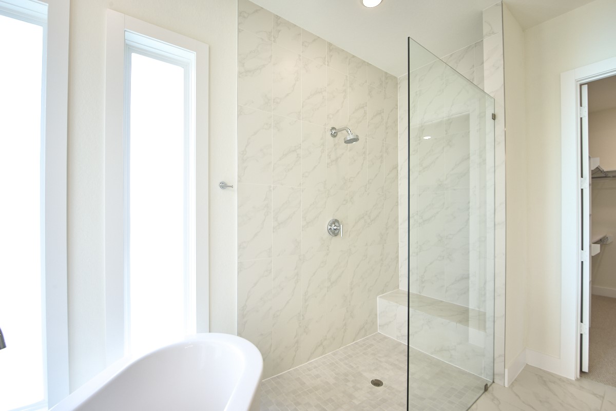 7911 Stratford Hall Drive Rosharon, TX 77583 - Photo 16 of 34 a bathroom with a toilet and a shower