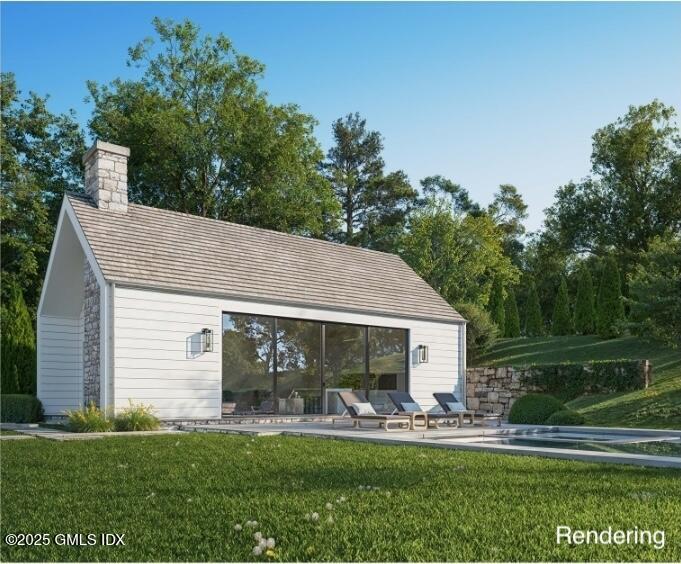 382 North Street Greenwich, CT 06830 - Photo 7 of 27 a front view of house with yard patio and green space
