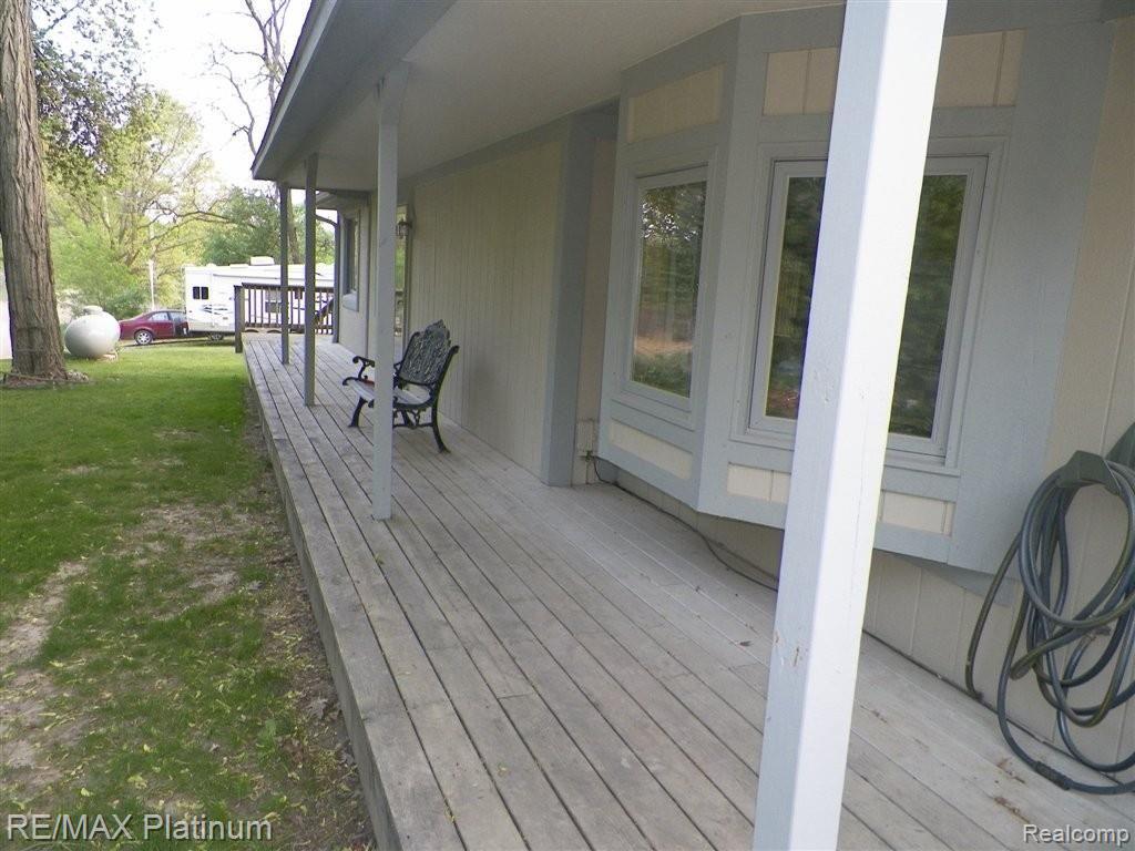 7215 Mabley Hill Road Fenton, MI 48430 - Photo 23 of 24 Wrap around porch