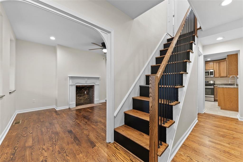 323 1st Street Apollo, PA 15613 - Photo 14 of 35 Stair case with wrought iron balisters