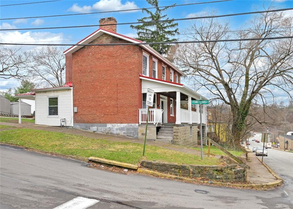 323 1st Street Apollo, PA 15613 - Photo 6 of 35 Side walk that leads to town