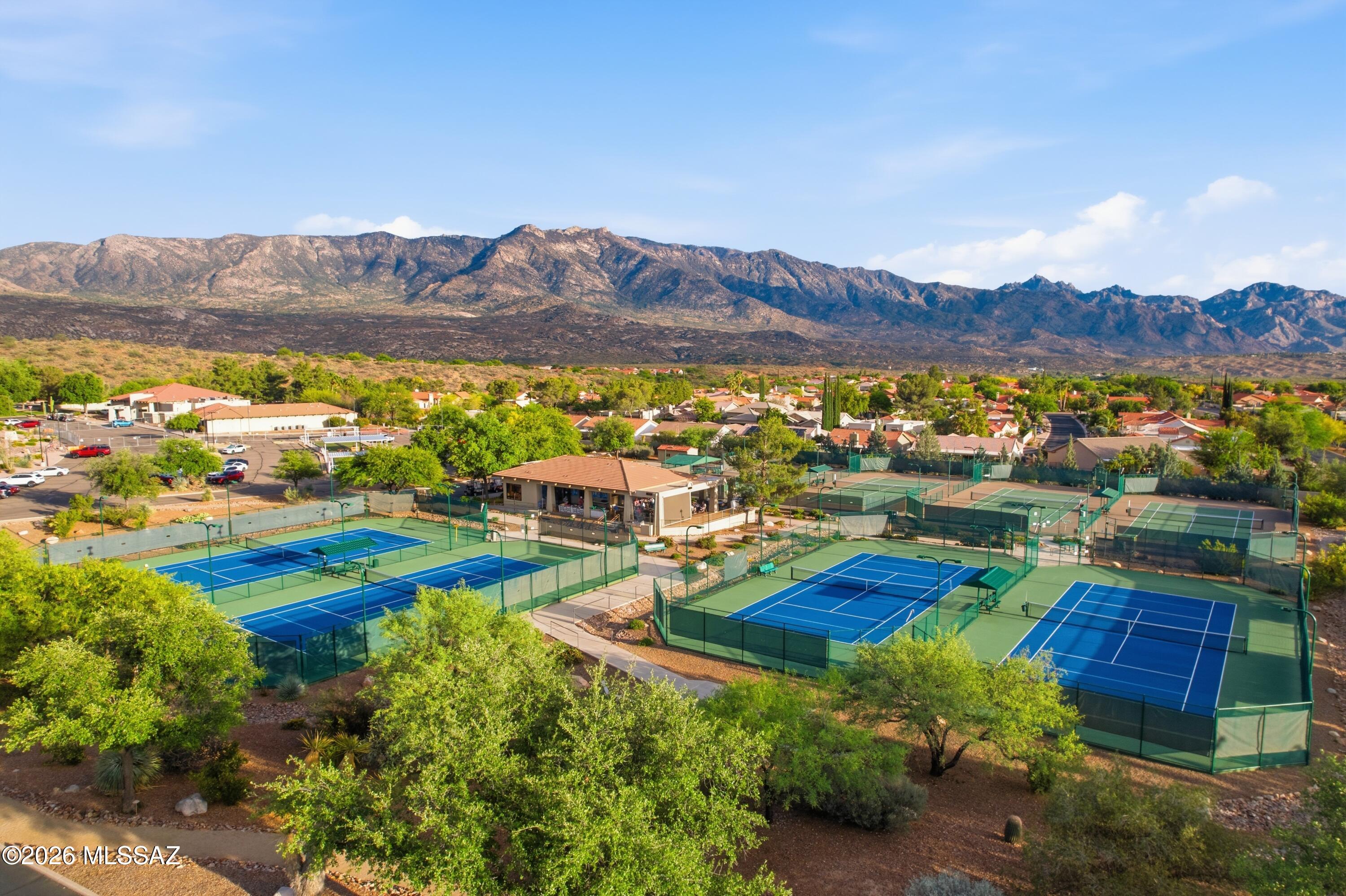 64351 East Wind Ridge Circle Tucson, AZ 85739 - Photo 31 of 41 a view of a city with mountains in the background