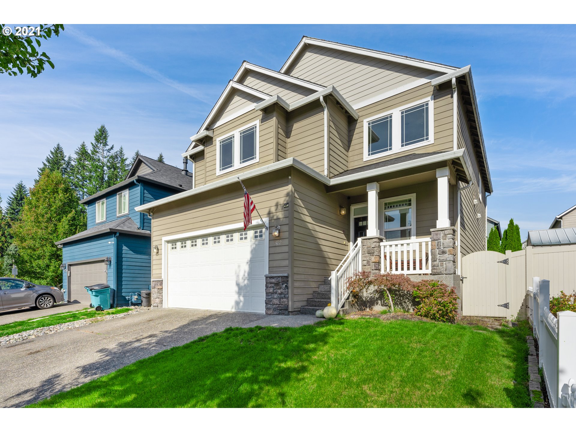 3122 South 2nd Street Ridgefield, WA 98642 - Photo 2 of 30 a front view of a house with a garden
