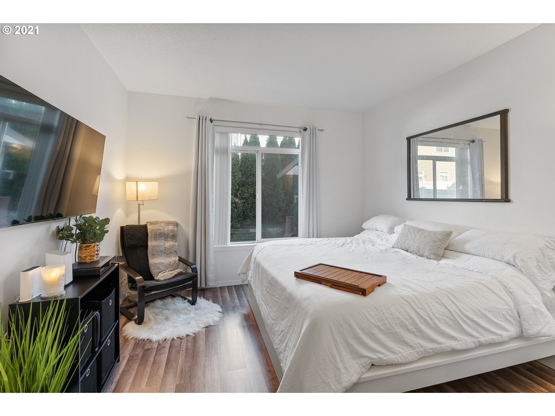 3122 South 2nd Street Ridgefield, WA 98642 - Photo 12 of 30 a bedroom with a bed and large windows