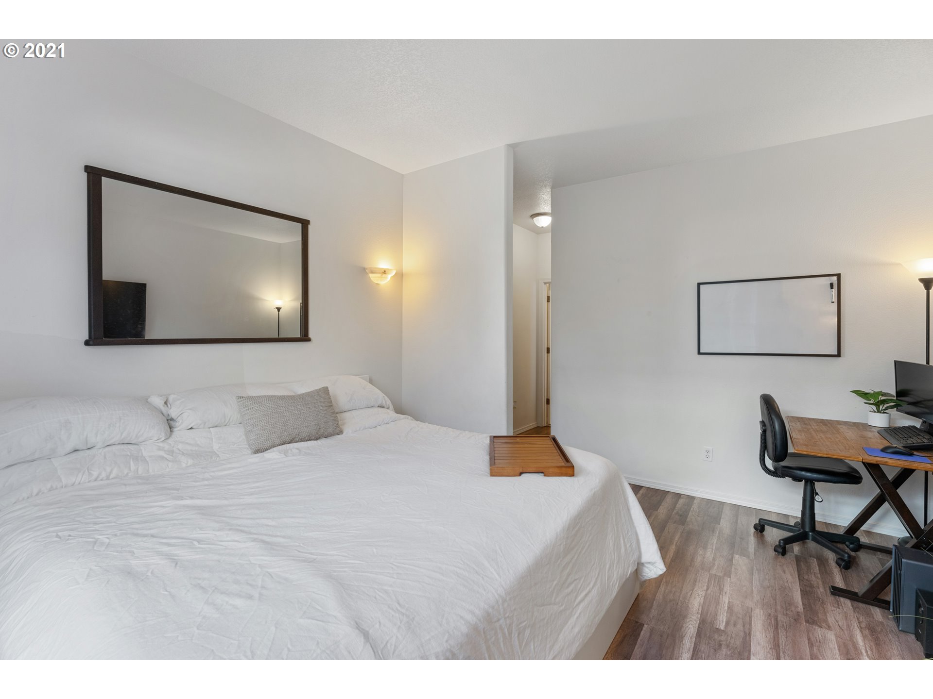 3122 South 2nd Street Ridgefield, WA 98642 - Photo 14 of 30 a bedroom with a bed and a flat screen tv