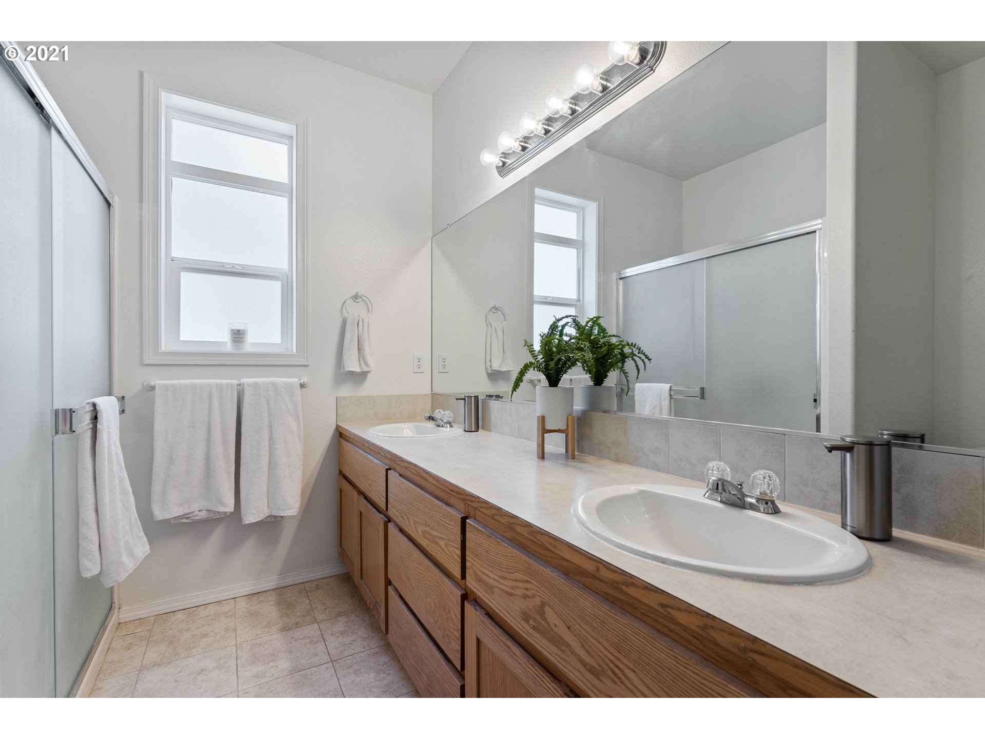 3122 South 2nd Street Ridgefield, WA 98642 - Photo 15 of 30 a bathroom with a sink and a mirror
