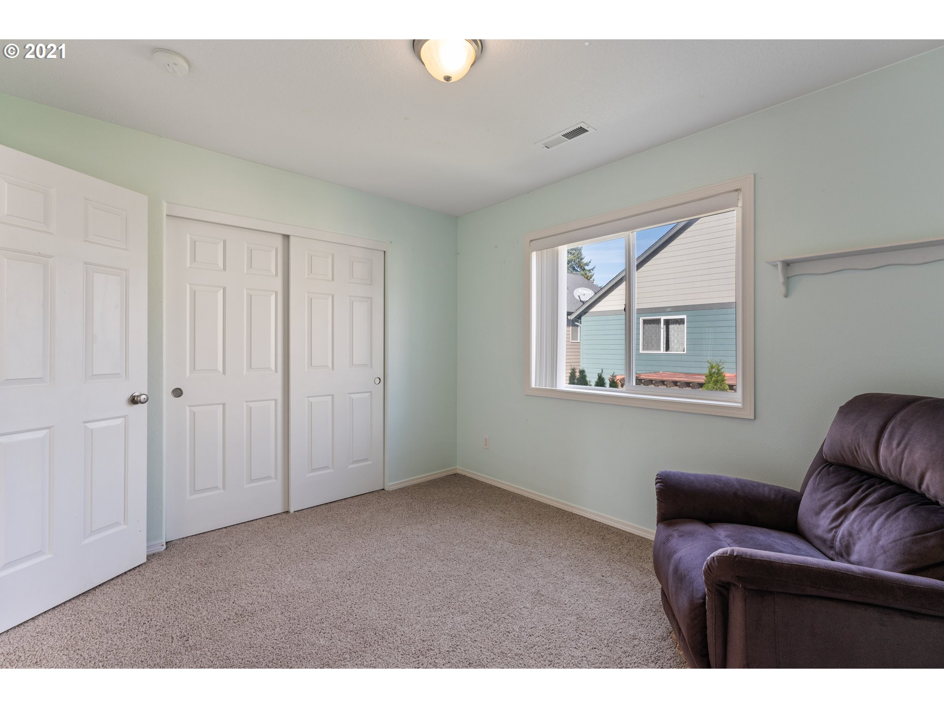 3122 South 2nd Street Ridgefield, WA 98642 - Photo 23 of 30 a living room with furniture and a window
