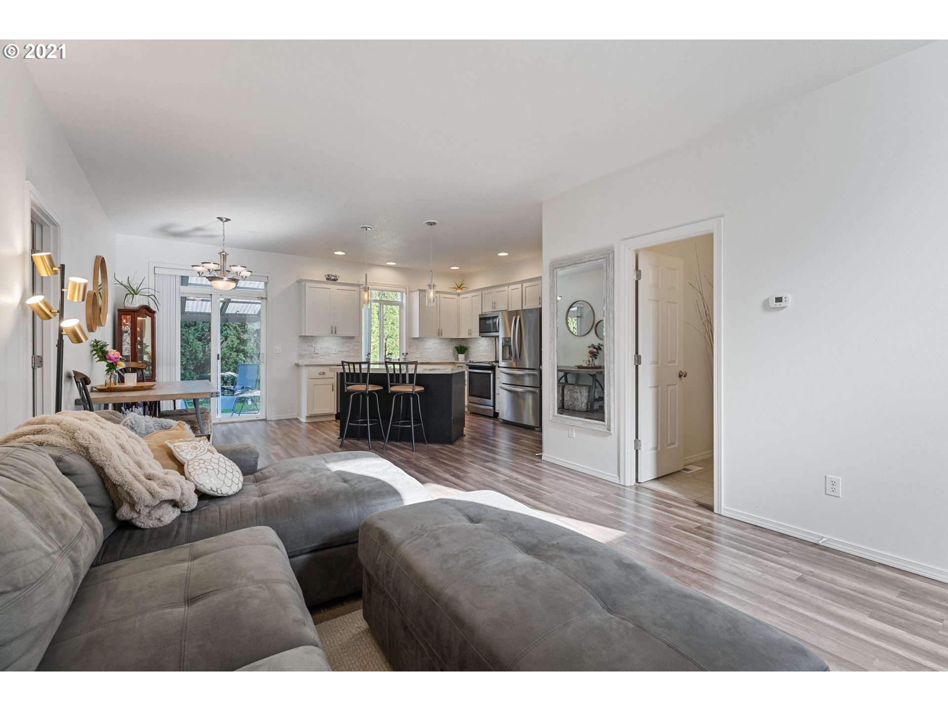3122 South 2nd Street Ridgefield, WA 98642 - Photo 27 of 30 a living room with furniture and kitchen view