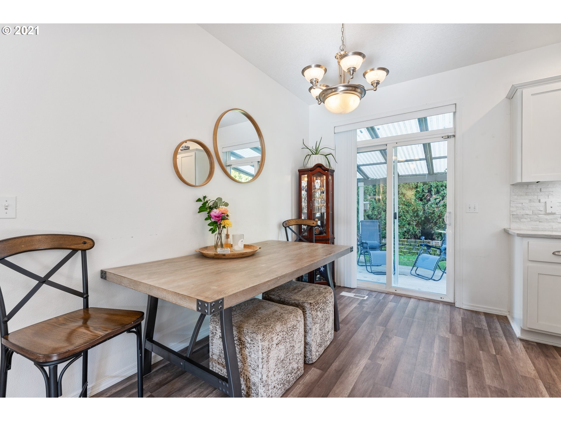 3122 South 2nd Street Ridgefield, WA 98642 - Photo 6 of 30 a view of a dining room with furniture window and wooden floor