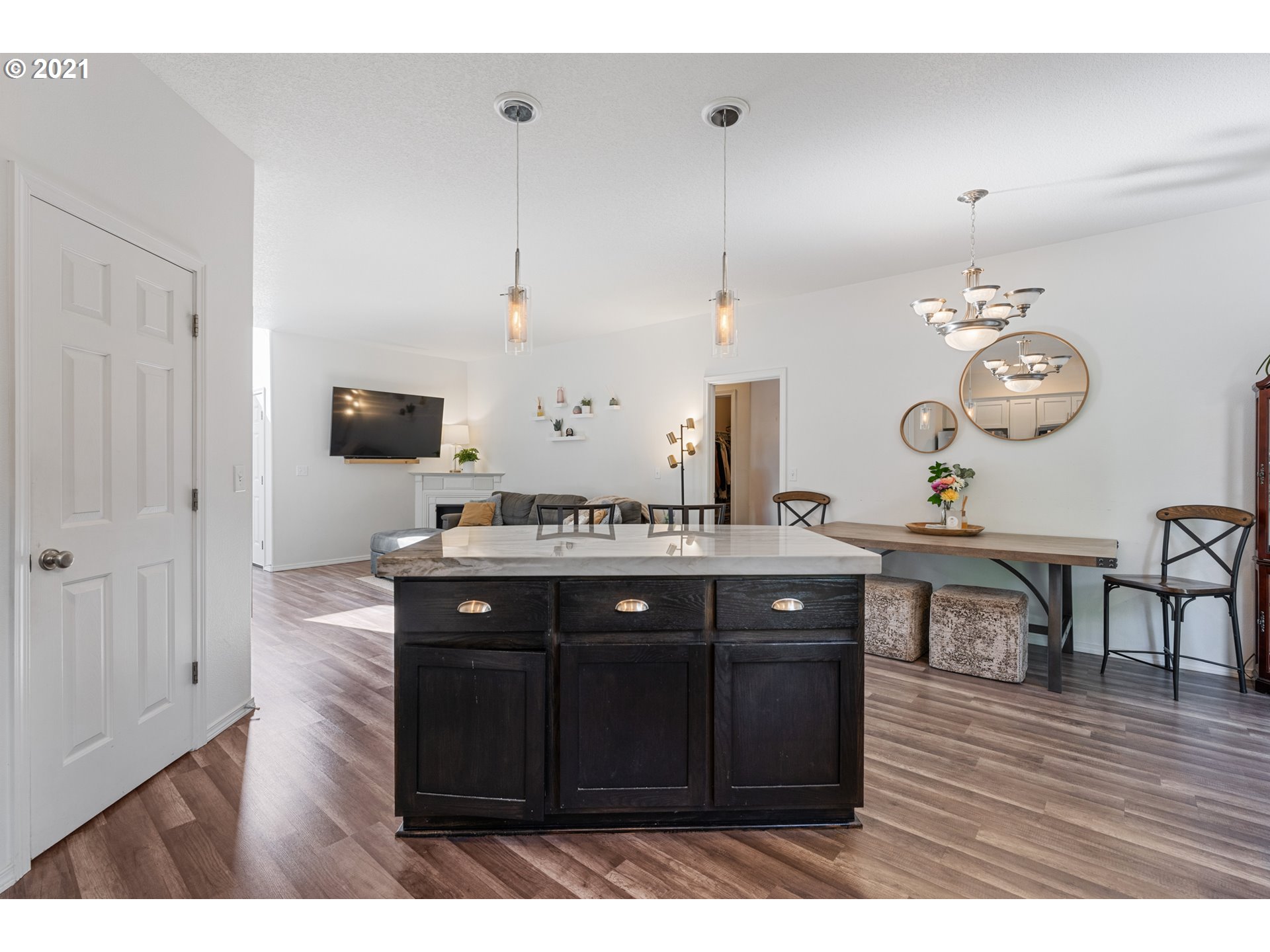 3122 South 2nd Street Ridgefield, WA 98642 - Photo 9 of 30 a kitchen with a wooden table and chairs
