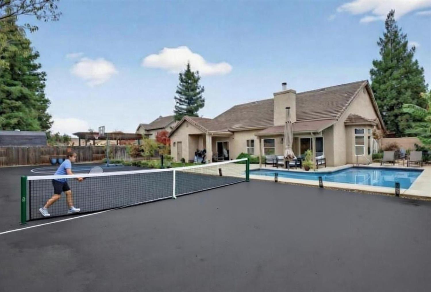 3221 Amethyst Way Turlock, CA 95382 - Photo 62 of 62 view of court featuring a basketbal, PICKLEball or TENNIS court OPTIONS. AI GEN