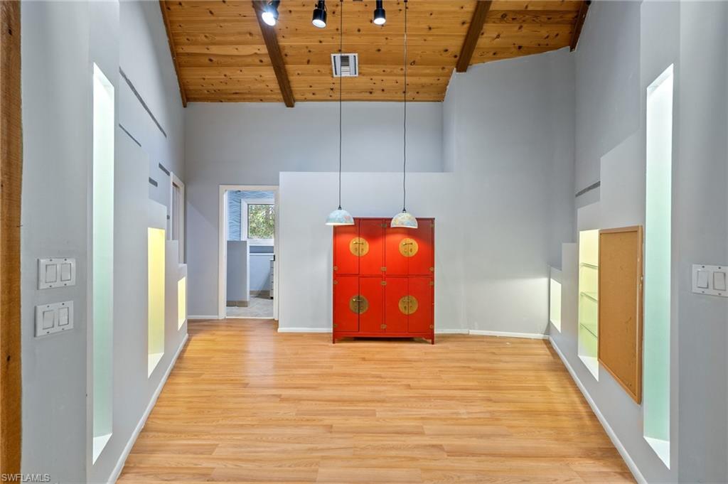 3775 27th Avenue Southwest Naples, FL 34117 - Photo 14 of 38 a view of a room with wooden floor