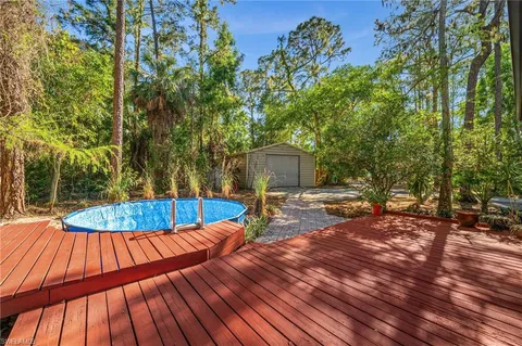 a view of a swimming pool with a patio