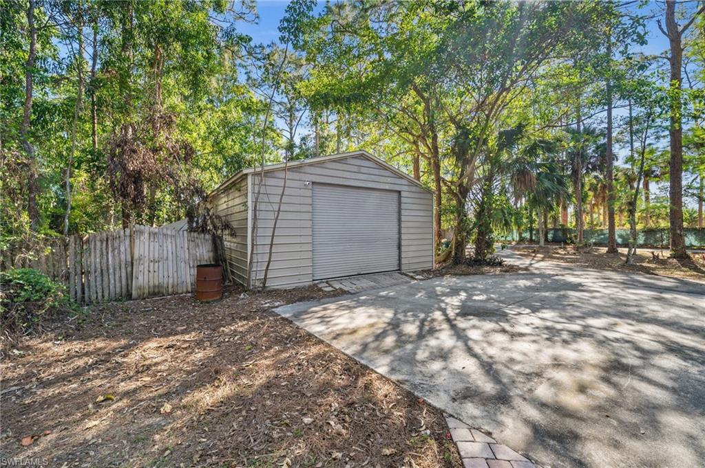 3775 27th Avenue Southwest Naples, FL 34117 - Photo 32 of 38 a view of a house with a tree
