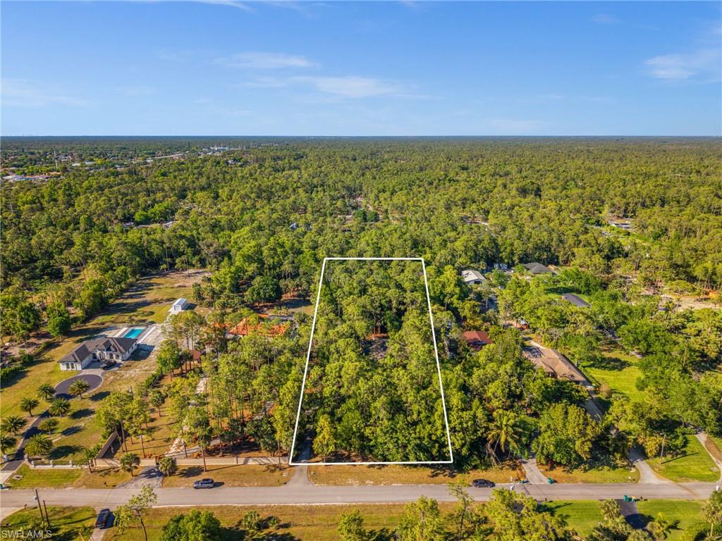 3775 27th Avenue Southwest Naples, FL 34117 - Photo 35 of 38 a view of yard with ocean view
