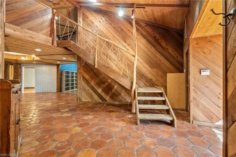 a view of entryway with a front door