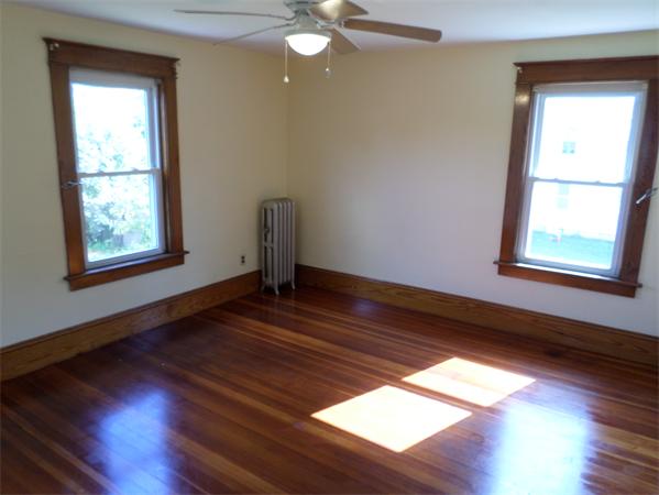 41 Ruggles Street Three Rivers, MA 01080 - Photo 25 of 30 a view of empty room with wooden floor and fan