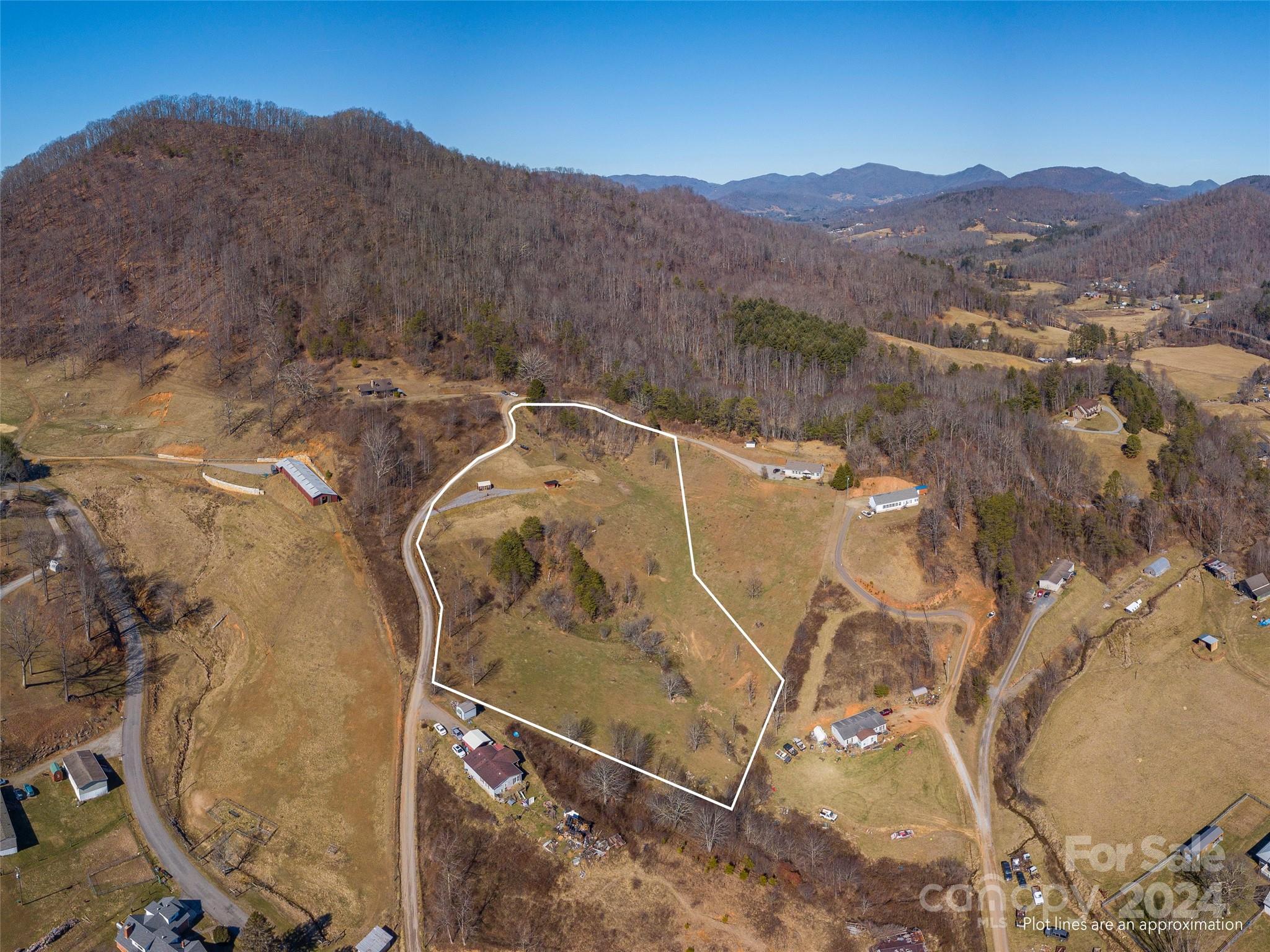 0 Fox Run Road Canton, NC 28716 - Photo 7 of 9 a view of a swimming pool with mountains in the background