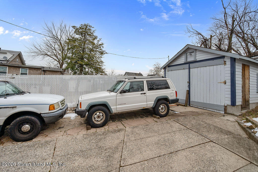 5272 Arthur Kill Road Staten Island, NY 10307 - Photo 15 of 32 a view of a car in front of a house