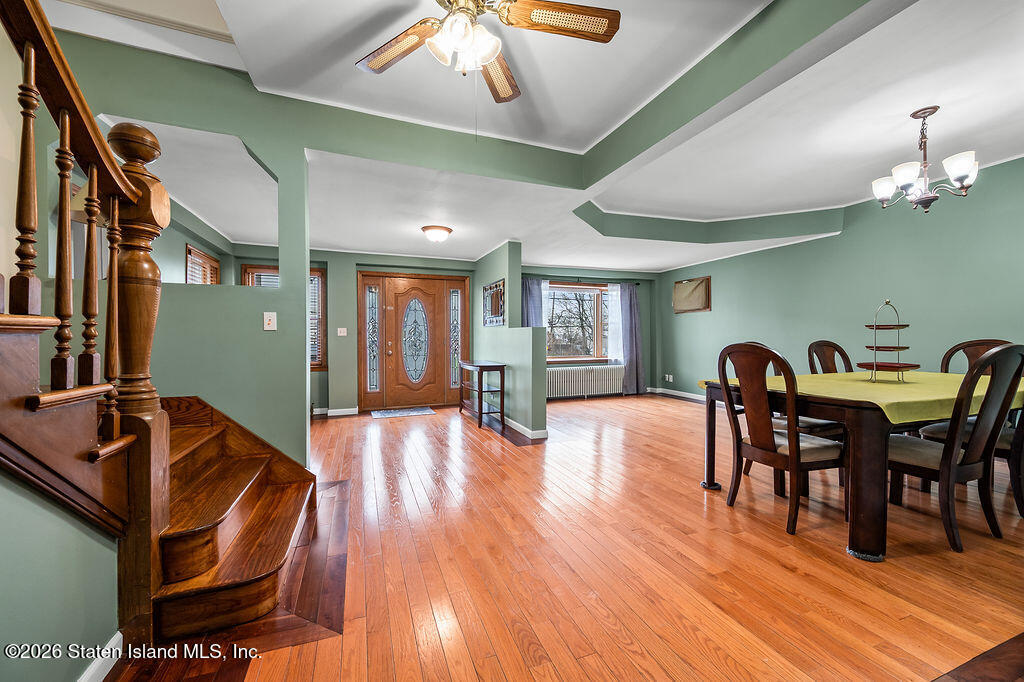 5272 Arthur Kill Road Staten Island, NY 10307 - Photo 6 of 32 a view of a dining room with furniture and wooden floor