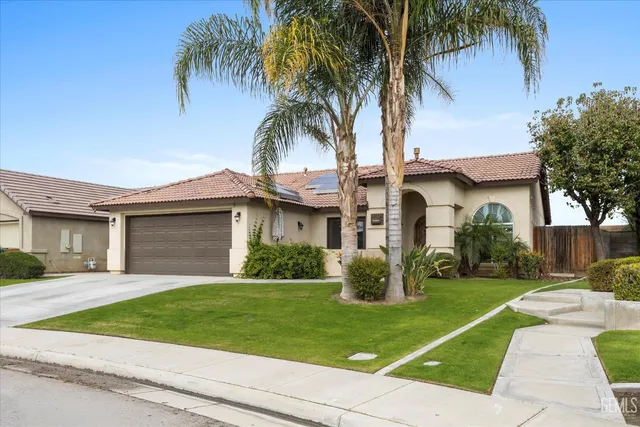 a house view with a garden space
