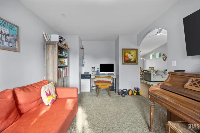 a view of swimming pool with outdoor seating and plants