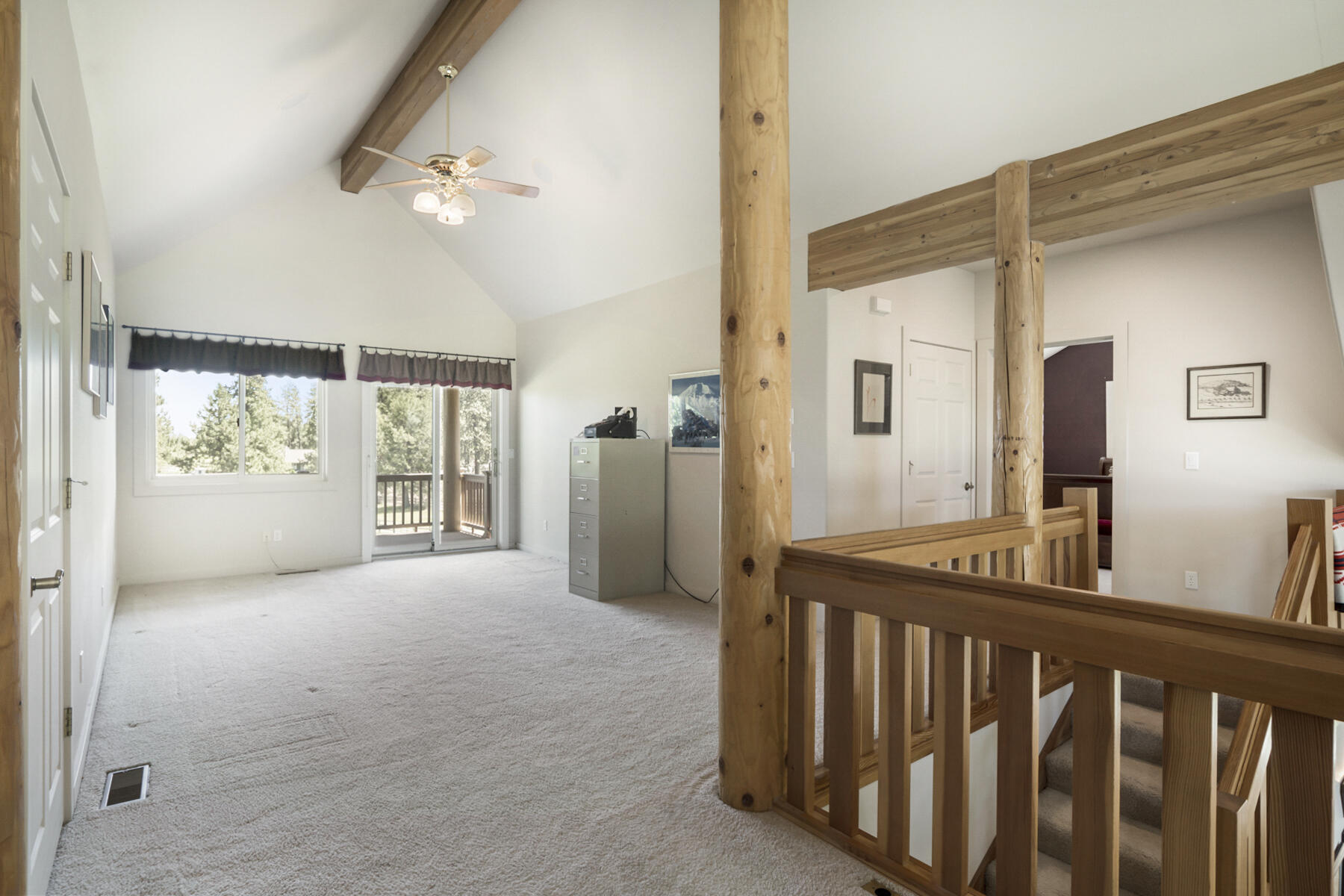 60696 Tekampe Road Bend, OR 97702 - Photo 27 of 61 a view of a hallway with interior of the house