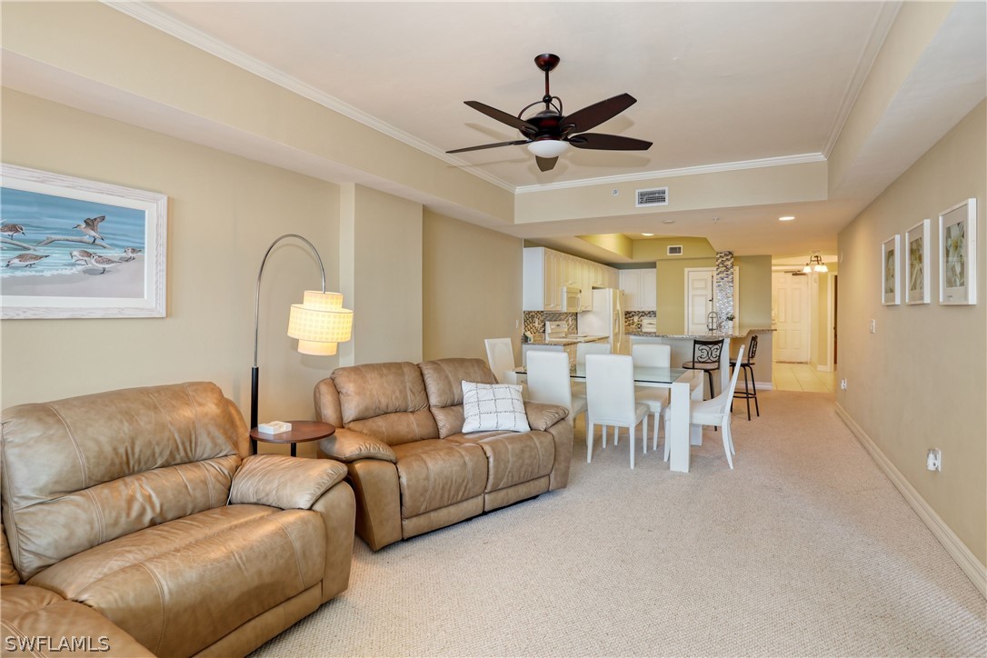 2797 First Street, Unit 1802 Fort Myers, FL 33916 - Photo 14 of 32 a living room with furniture and a large window