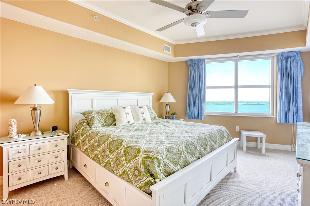 2797 First Street, Unit 1802 Fort Myers, FL 33916 - Photo 15 of 32 a bedroom with a bed and a window